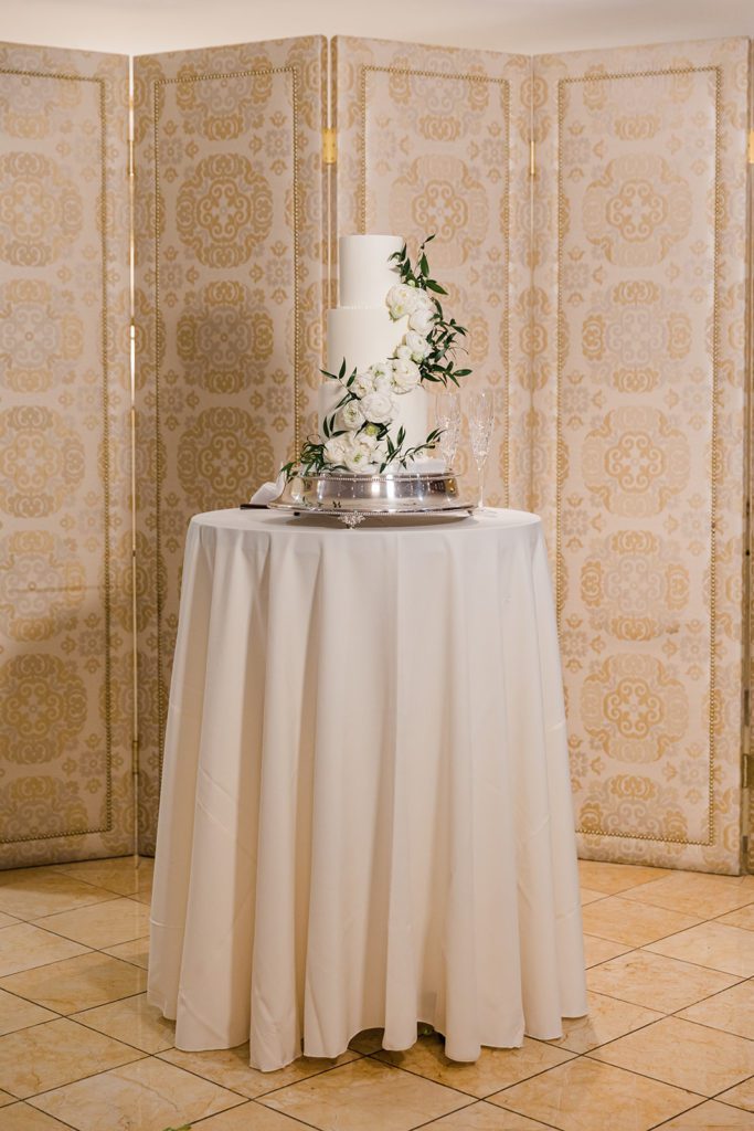 Classic white three tiered wedding cake