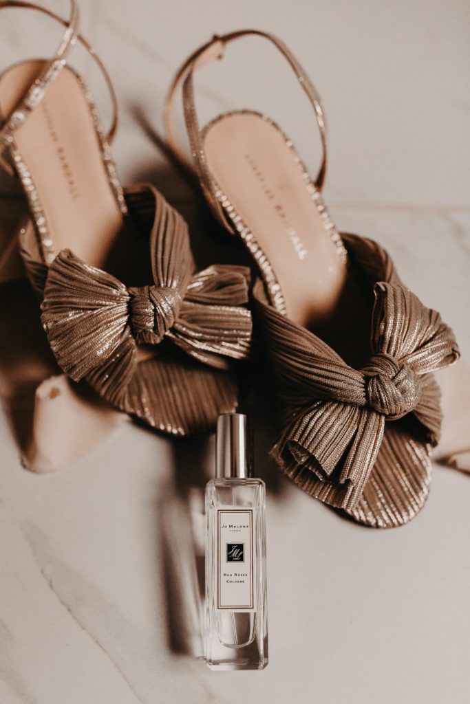 Wedding shoe and perfume detail